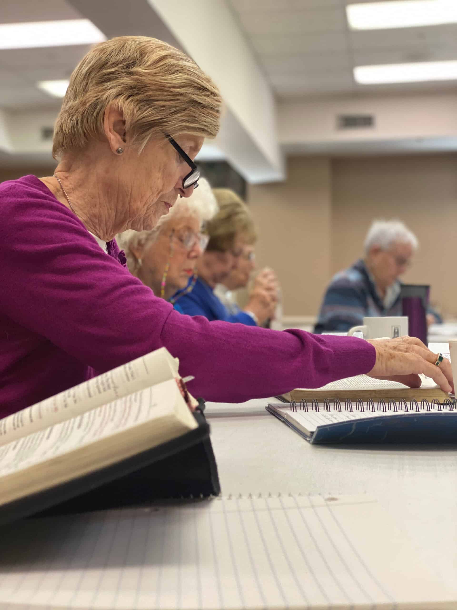 Elderly woman participating in church activity at Saint Andrew's Episcopal Church.