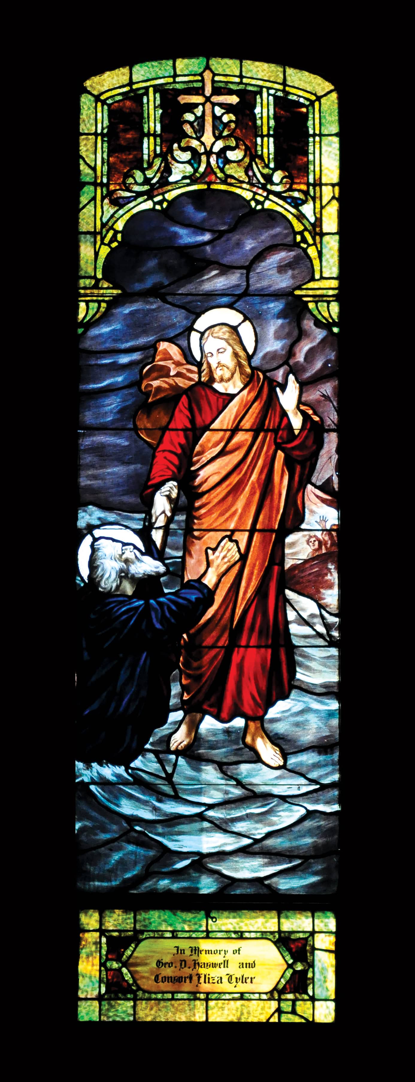 Stained glass window depicting Jesus and a disciple at Saint Andrew's Episcopal Church.