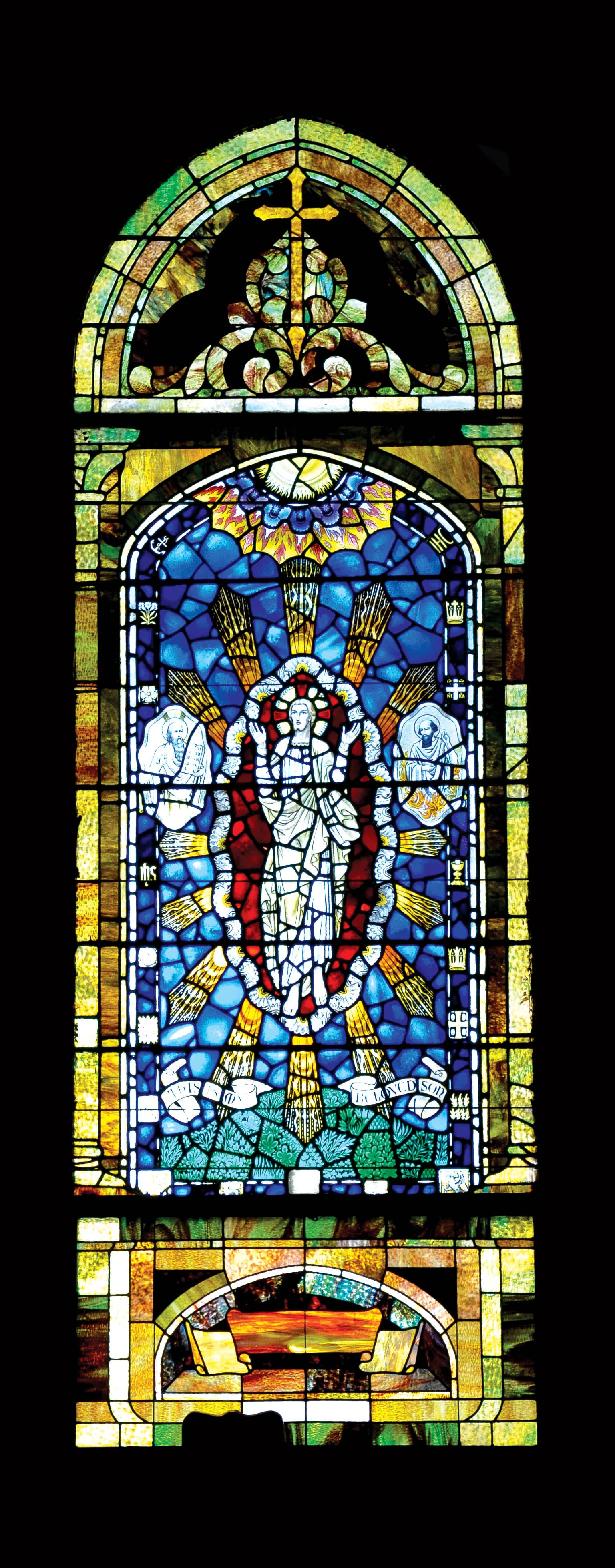 Stained glass window depicting Jesus Christ with angels at Saint Andrew's Episcopal Church.