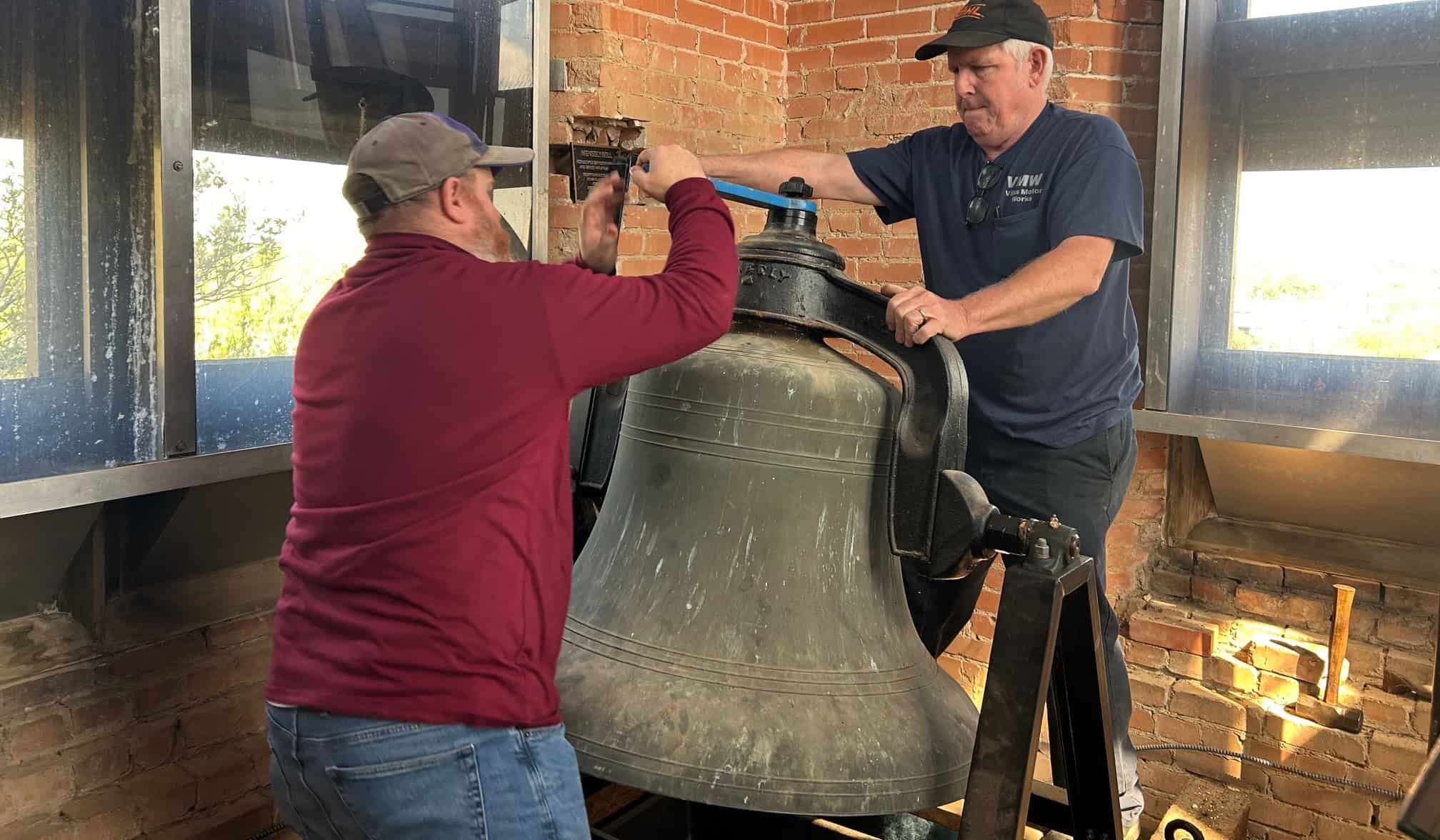 Bell being rung at Saint Andrew's Episcopal Church during a service or event.